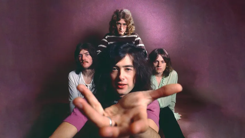 A vintage portrait of the four members of Led Zeppelin, with guitarist Jimmy Page reaching toward the camera
