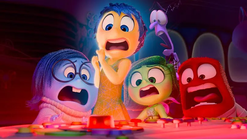 The animated emotion characters of Inside Out swirling together in a colorful mindscape