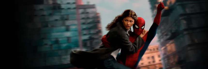 Spider-Man swinging between city buildings while carrying a passenger in a still from the film